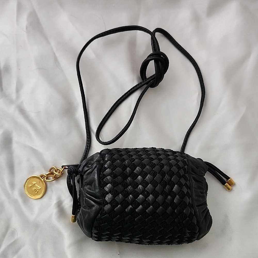 Chic Black Woven Mini Bag with Gold Charm